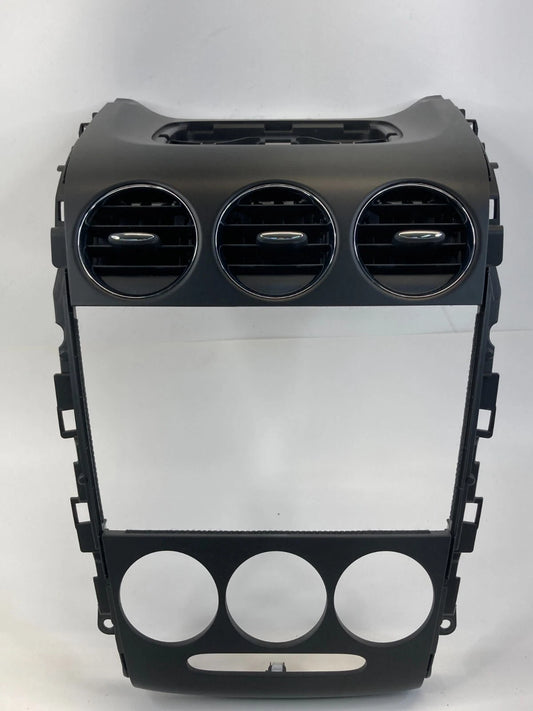 10-12 MAZDA CX-7 DASH FACEPLATE RADIO CLIMATE CONTROL TRIM BEZEL W/ AIR VENT OEM