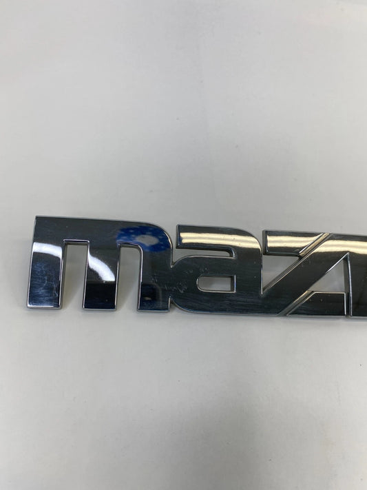2000-2006 MAZDA MPV REAR TRUNK DECK LID NAME NAMEPLATE BADGE LOGO LC62-51710 OEM