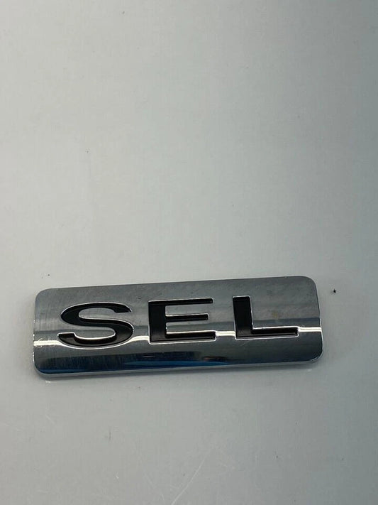 2008-2011 FORD FOCUS SEDAN SEL REAR HATCH TRUNK LID EMBLEM LOGO TRIM OEM