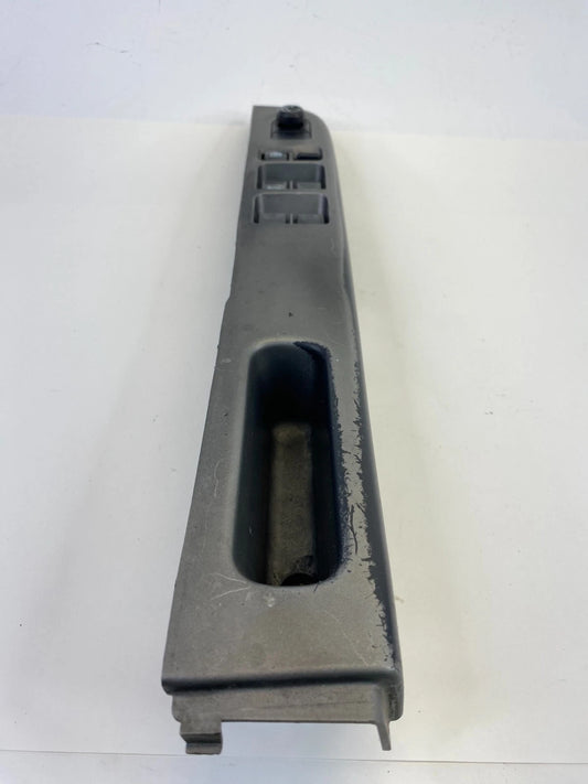 2000-2004 NISSAN XTERRA FRONT LEFT MASTER WINDOW CONTROL SWITCH W/ BEZEL OEM