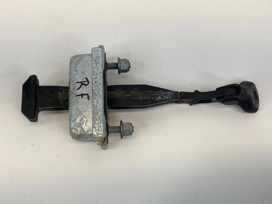 2012-2018 FORD FOCUS SEDAN FRONT RIGHT DOOR LOCK CHECK STOPPER STRAP CM51A23500