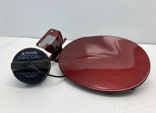 2007-2009 MAZDA CX-7 FUEL FILLER DOOR GAS LID COVER COPPER RED MICA W/ CAP OEM