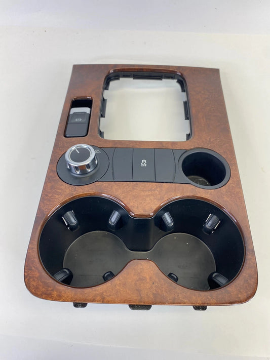 11-14 VW TOUAREG CENTER CONSOLE SHIFT PLATE TRIM W/ TRACTION SWITCH & CUP HOLDER