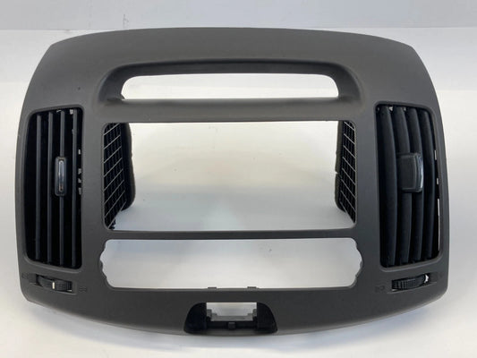 07-10 HYUNDAI ELANTRA CENTER DASH RADIO BEZEL CLIMATE CONTROL TRIM W AIR VENT