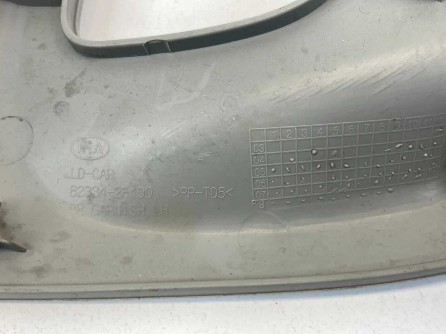 2004-2009 KIA SPECTRA RR LH DOOR PANEL SWITCH BEZEL TRIM COVER OEM 82334-2F100