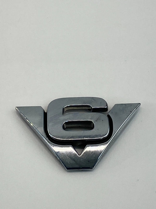 2007-2012 FORD ESCAPE FRONT FENDER CHROME V6 NAMEPLATE EMBLEM OEM