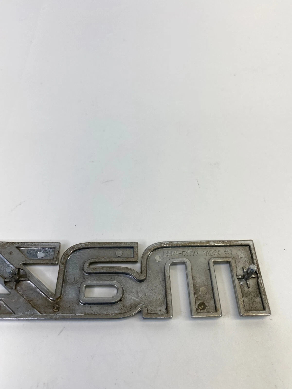 2000-2006 MAZDA MPV REAR TRUNK DECK LID NAME NAMEPLATE BADGE LOGO LC62-51710 OEM