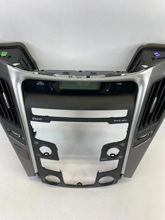 11-14 HYUNDAI SONATA CENTER DASH RADIO CLIMATE CONTROL BEZEL W/AIR VENTS & CLOCK
