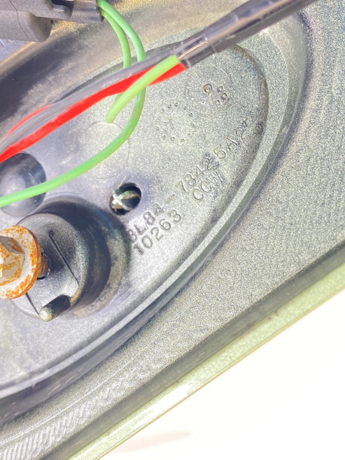 2008-2012 FORD ESCAPE TAILGATE LID LICENSE PLATE TRIM PANEL WITH LIGHT BEZEL OEM