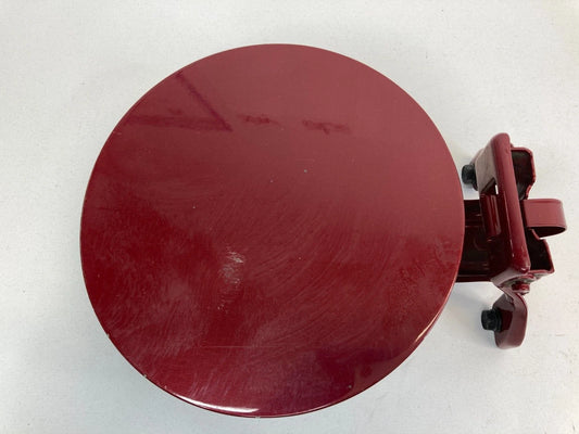 2007-2010 KIA SEDONA BASE FUEL FILLER DOOR GAS LID COVER 7P CHERRY KISS OEM