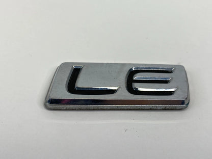 2009-2013 TOYOTA COROLLA LE REAR EMBLEM TRUNK LOGO BADGE NAMEPLATE LUGGAGE OEM