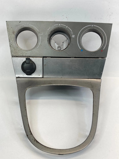 03-08 TOYOTA MATRIX SHIFTER CLIMATE CONTROL TRIM BEZEL W STORAGE & POWER OUTLET
