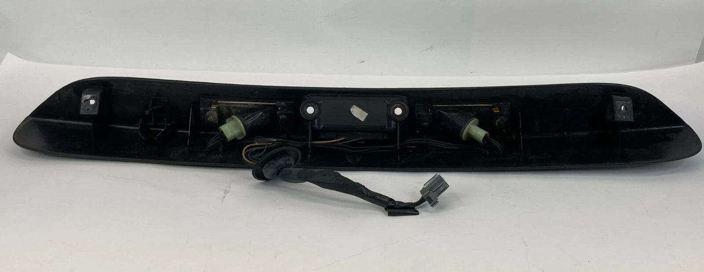 01-05 DODGE CARAVAN REAR TRUNK LIFT GATE LICENSE PLATE HANDLE PANEL 04857231AE