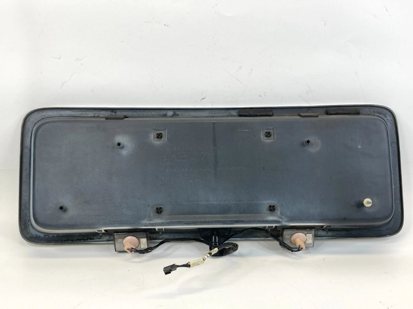 1995-1998 JEEP GRAND CHEROKE REAR TRUNK LICENSE PLATE HOLDER GARNISH MOLDING OEM