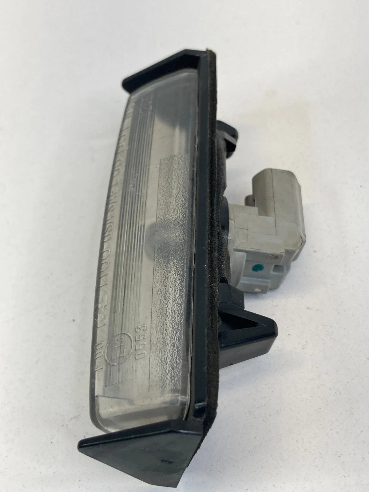 2002-2011 TOYOTA CAMRY REAR TRUNK LID LICENSE PLATE LIGHT LAMP LENS E130553 OEM
