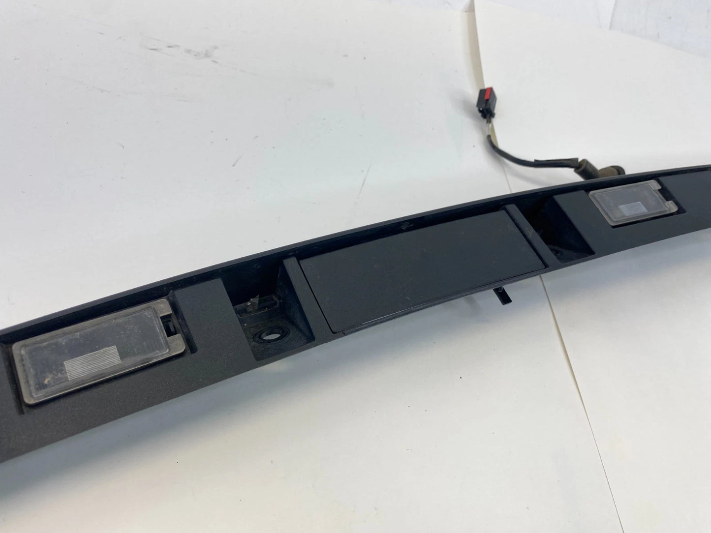 2013-2015 FORD POLICE INTERCEPTOR UTILITY TAILGATE LICENSE PLATE BEZEL TRIM OEM