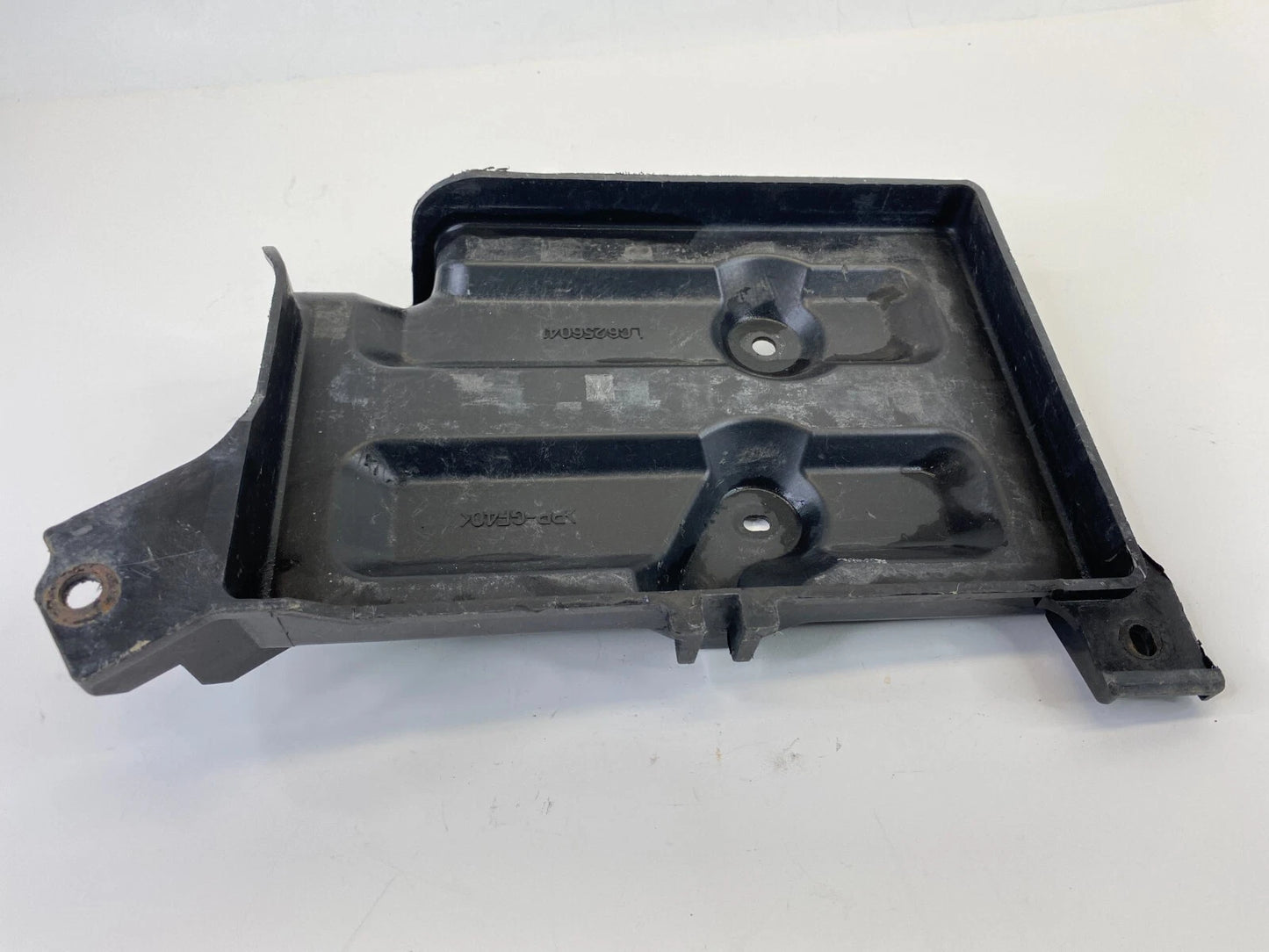 2000-2006 MAZDA MPV FRONT ENGINE BATTERY TRAY HOLDER PAD COVER OEM LC6256041