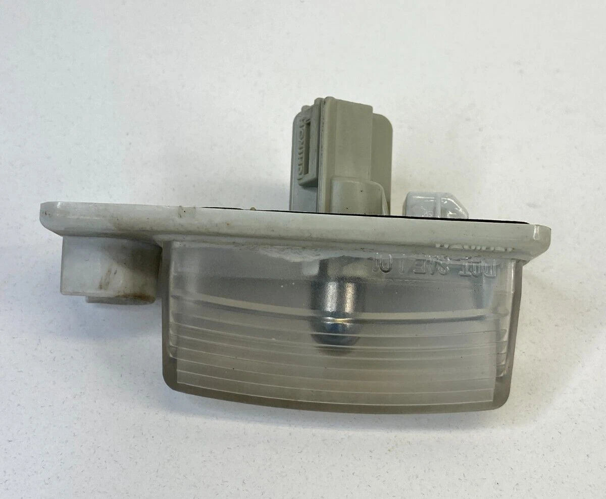 07-13 NISSAN ALTIMA 07-14 MAXIMA SD REAR LICENSE PLATE LIGHT LAMP ASSEMBLY OEM