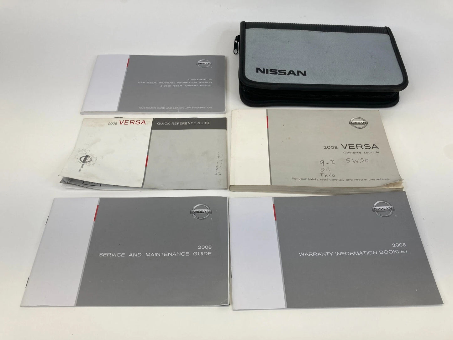 2008 NISSAN VERSA OWNERS MANUAL INFORMATION WARRANTY GUIDE BOOK SET W/ CASE OEM