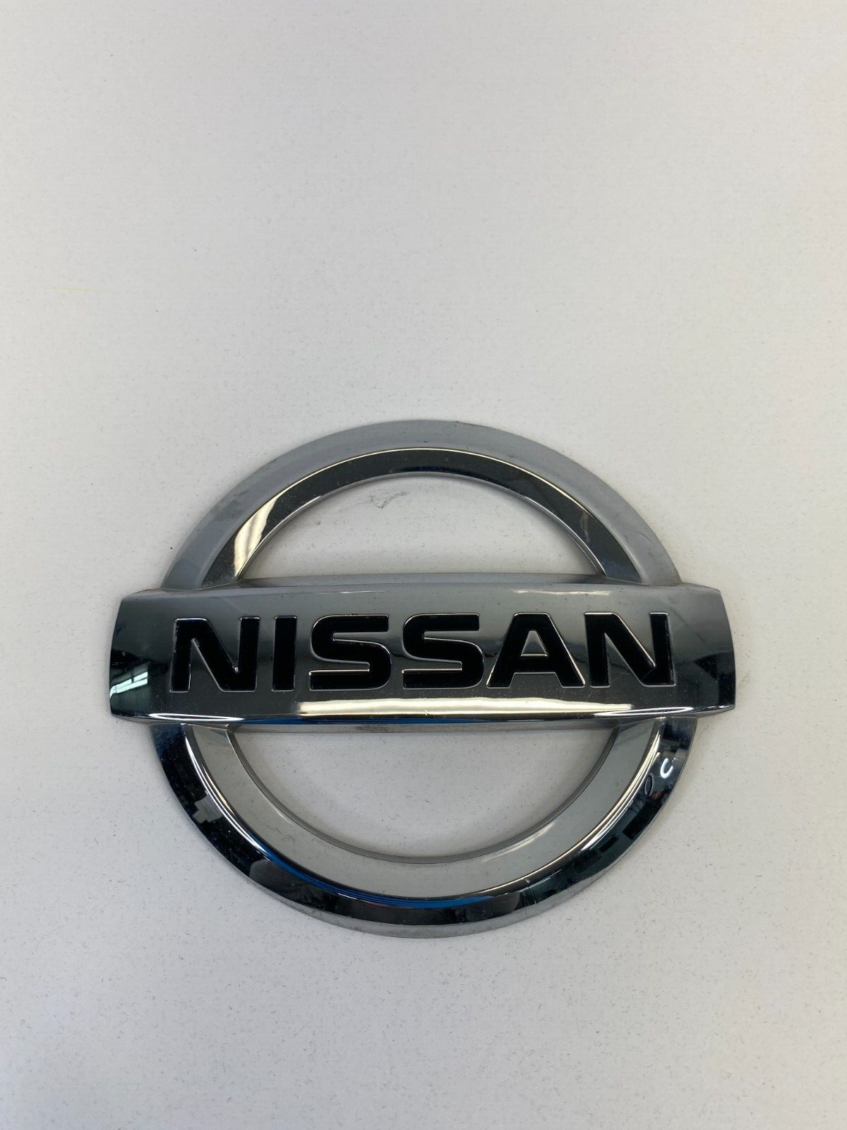 2008-2013 Nissan Rogue Rear Tailgate Emblem Badge Logo Chrome 84890-JM00A OEM