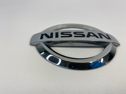 2008-2013 Nissan Rogue Rear Tailgate Emblem Badge Logo Chrome 84890-JM00A OEM