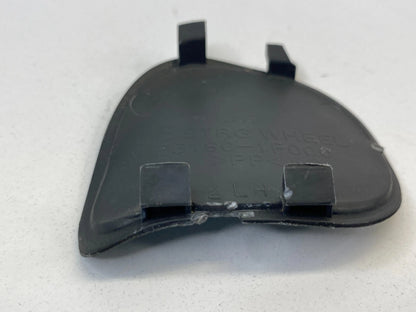 2005-2010 KIA SPORTAGE LEFT SIDE STEERING WHEEL PLASTIC LID COVER TRIM CAP OEM
