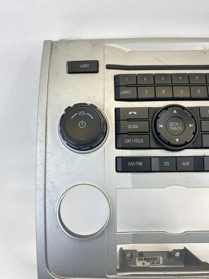 2009-2011 MERCURY MARINER RADIO CONTROL FACE PLATE PANEL BEZEL 9L8T-18A802-BB