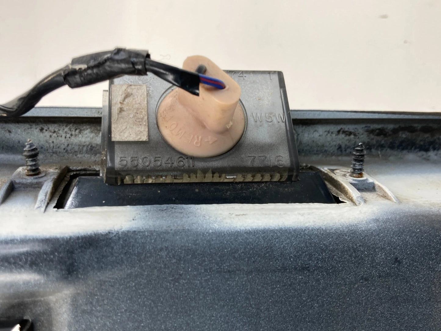 1995-1998 JEEP GRAND CHEROKE REAR TRUNK LICENSE PLATE HOLDER GARNISH MOLDING OEM