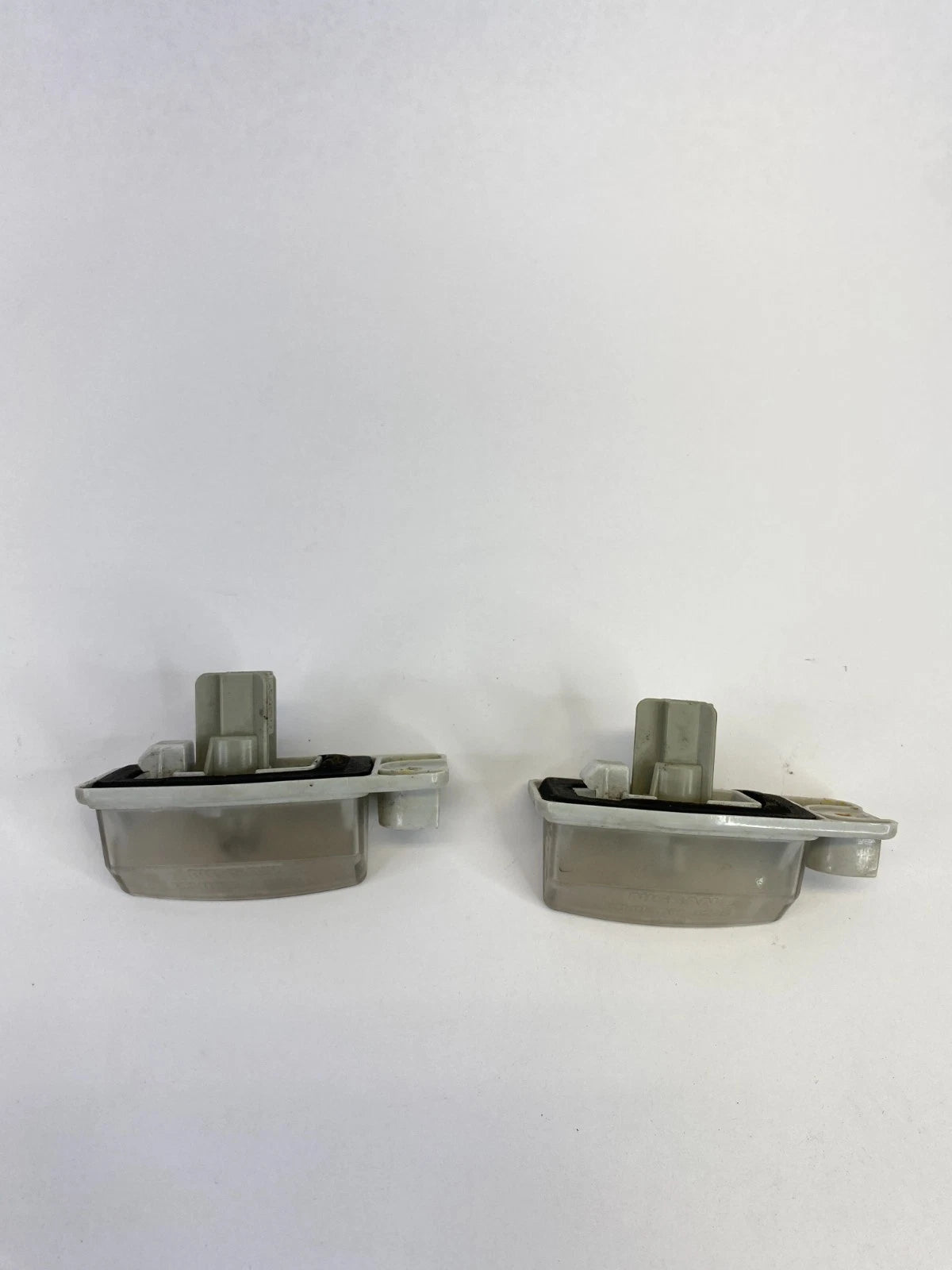 2007-2012 NISSAN ALTIMA LICENSE PLATE LIGHT LAMP TAG HOUSING LENS PAIR OEM