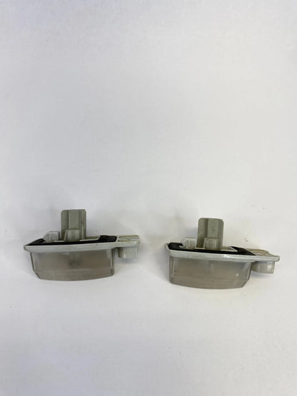 2007-2012 NISSAN ALTIMA LICENSE PLATE LIGHT LAMP TAG HOUSING LENS PAIR OEM