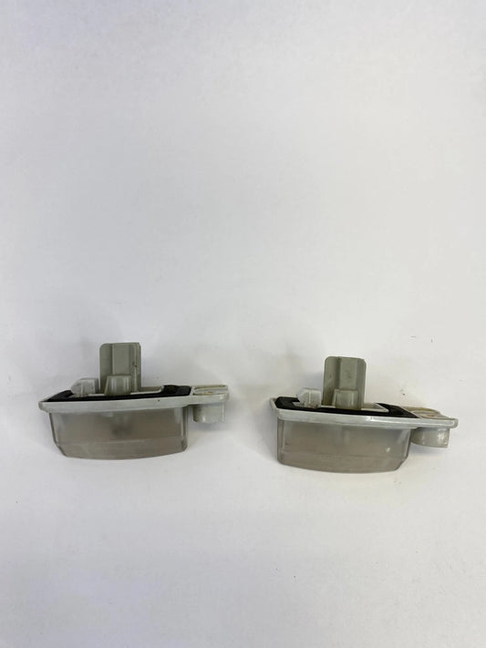 2007-2012 NISSAN ALTIMA LICENSE PLATE LIGHT LAMP TAG HOUSING LENS PAIR OEM