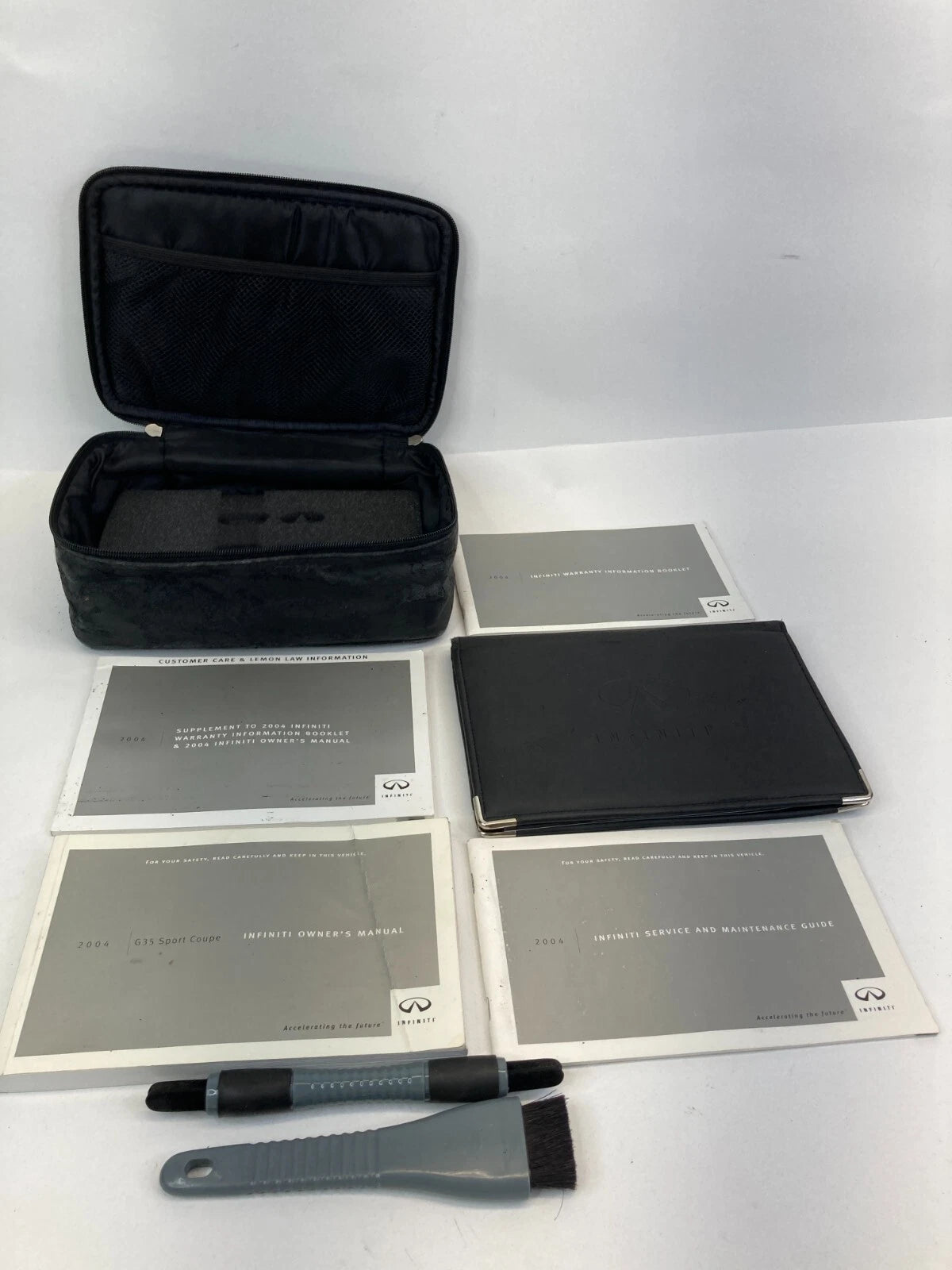 2004 INFINITI G35 COUPE OWNER'S MANUAL WARRANTY INFORMATION BOOKLET W/ CASE