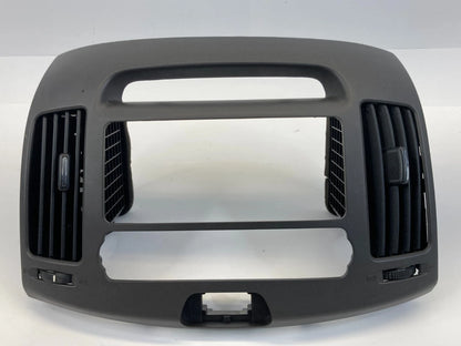 07-10 HYUNDAI ELANTRA CENTER DASH RADIO BEZEL CLIMATE CONTROL TRIM W AIR VENT