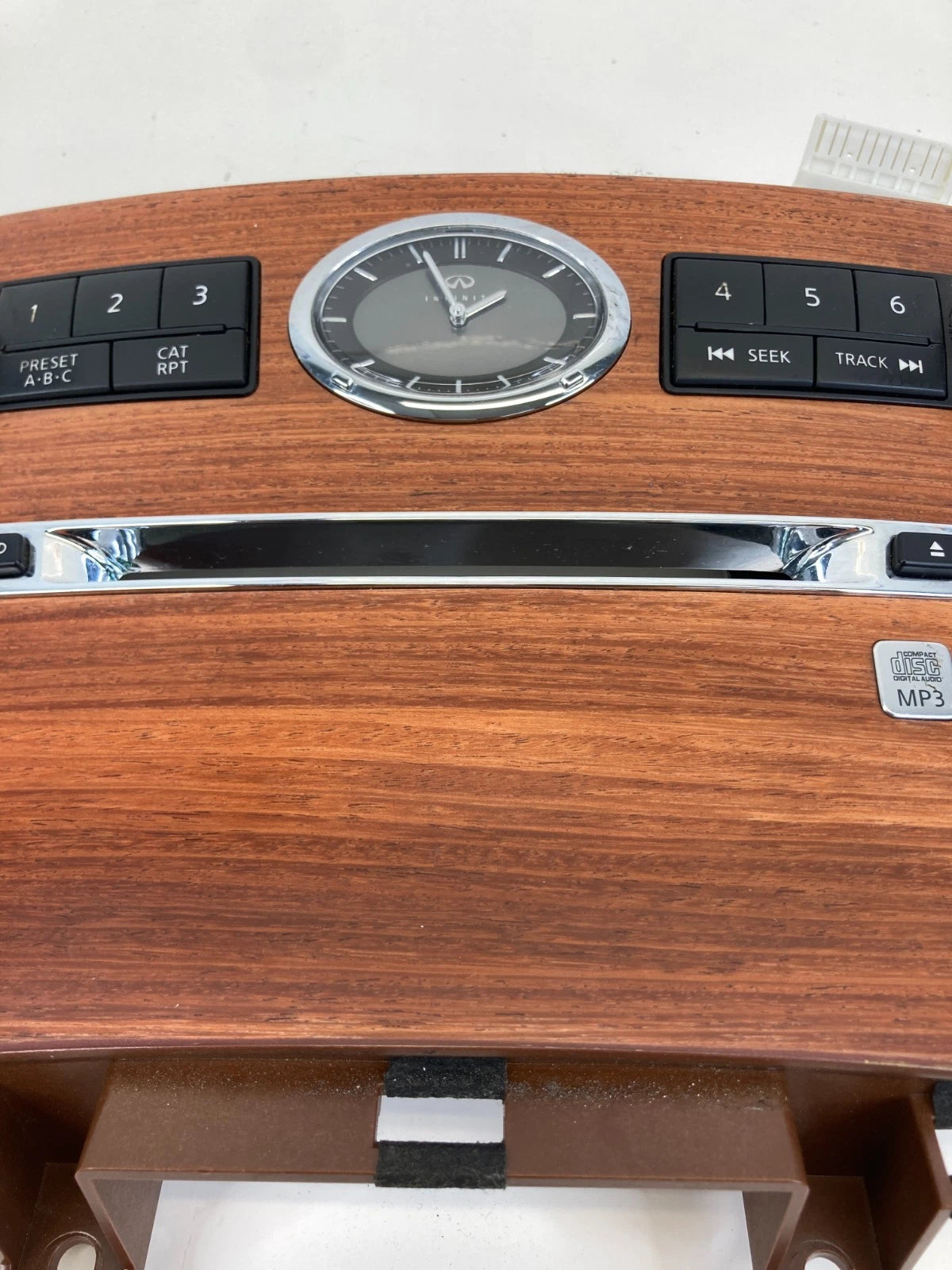 2006 2007 INFINITI M35 RADIO AUDIO CONTROL CENTER PANEL W/ CLOCK 68260-EH100 OEM