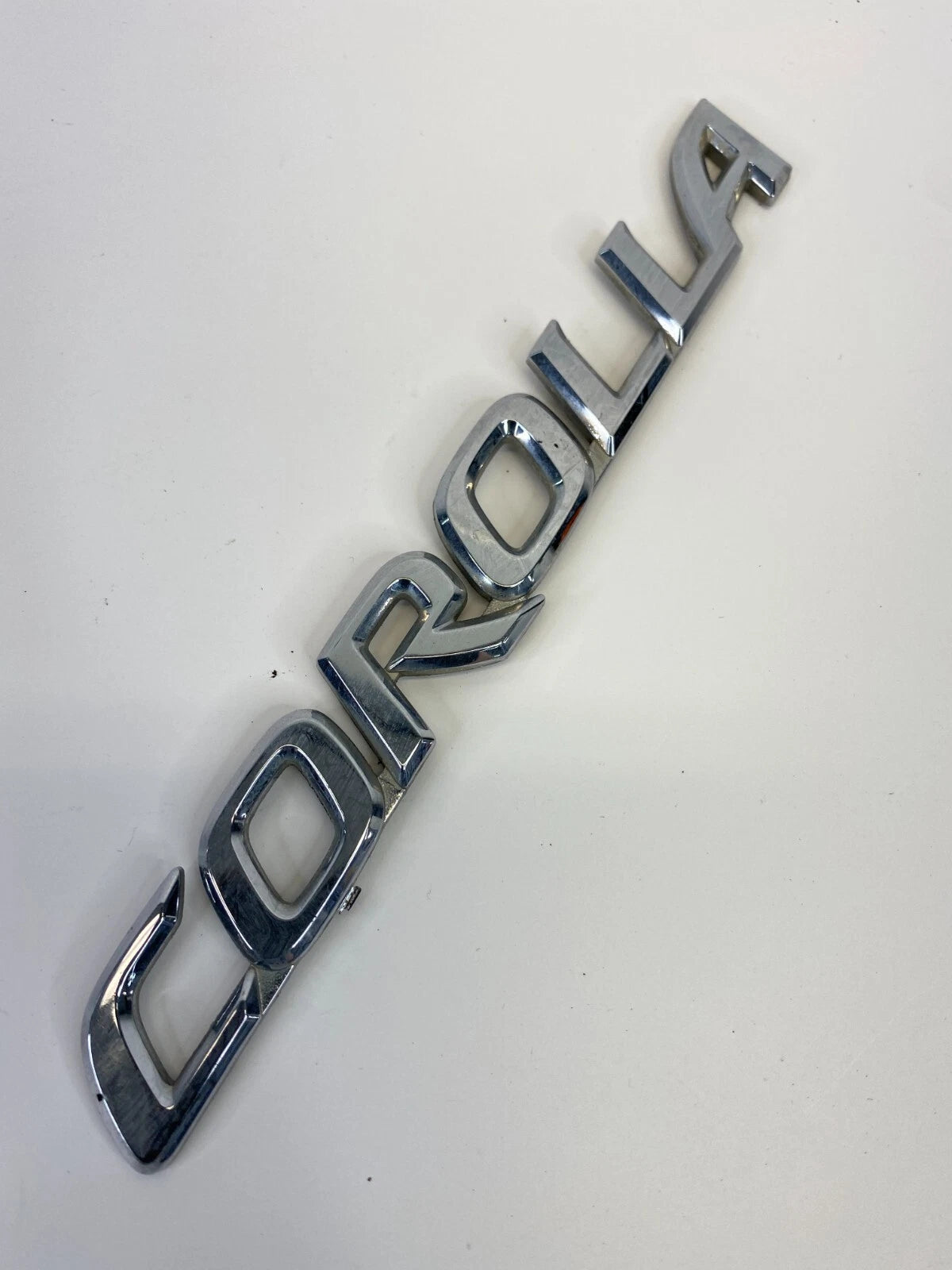 2003-2008 TOYOTA COROLLA REAR TRUNK LID NAMEPLATE EMBLEM BADGE OEM