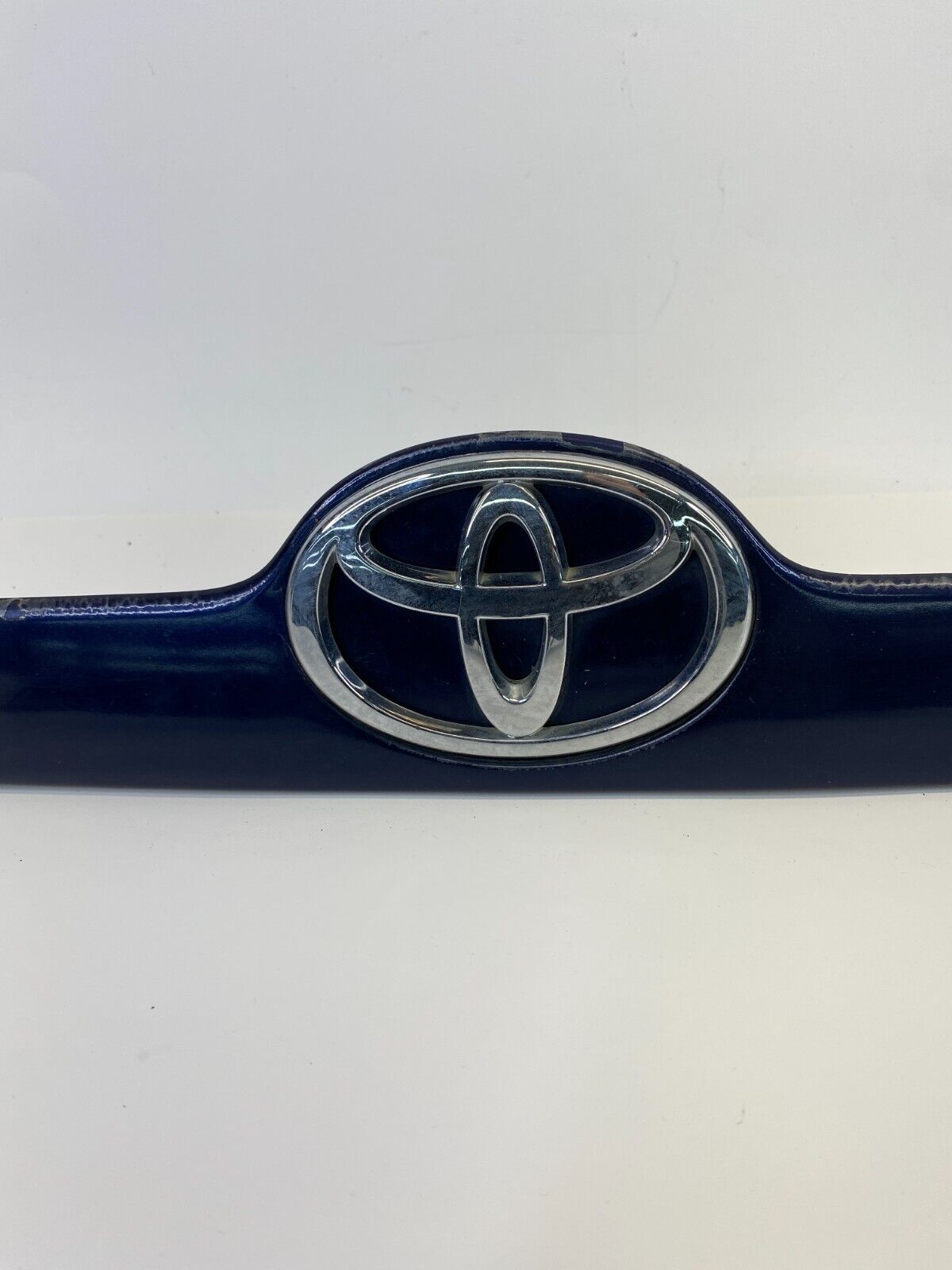 2003-2008 Toyota Corolla Rear Trunk Lid Garnish Molding Trim Emblem OEM