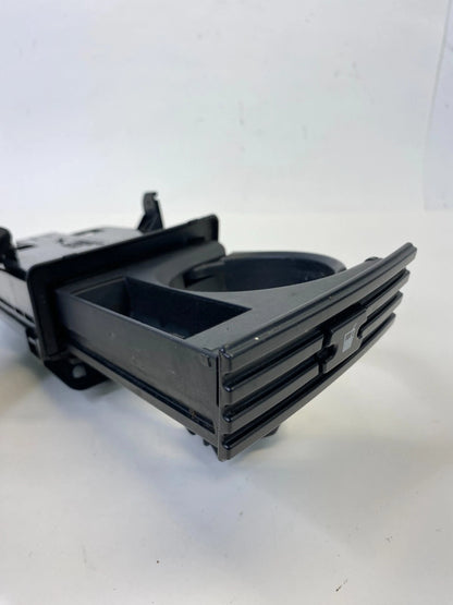 2004-2010 TOYOTA SIENNA CENTER CONSOLE DASH CUP HOLDER BEZEL TRIM 55620AE010 OEM
