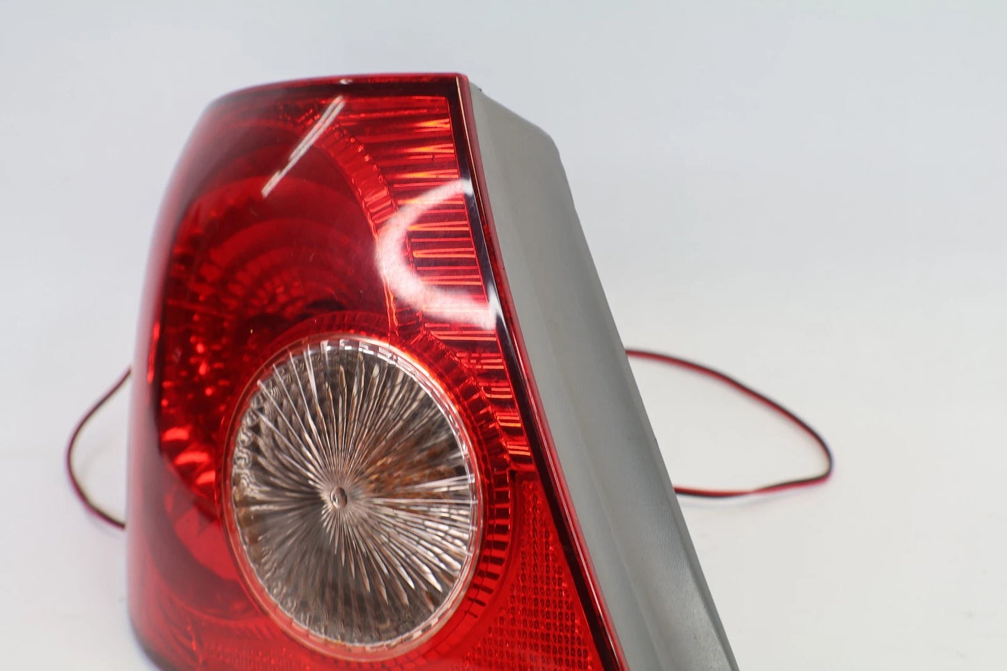 2005-2008 TOYOTA COROLLA SEDAN REAR LEFT OUTER TAILLIGHT TAIL LIGHT LAMP OEM