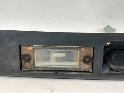 01-05 DODGE CARAVAN REAR TRUNK LIFT GATE LICENSE PLATE HANDLE PANEL 04857231AE