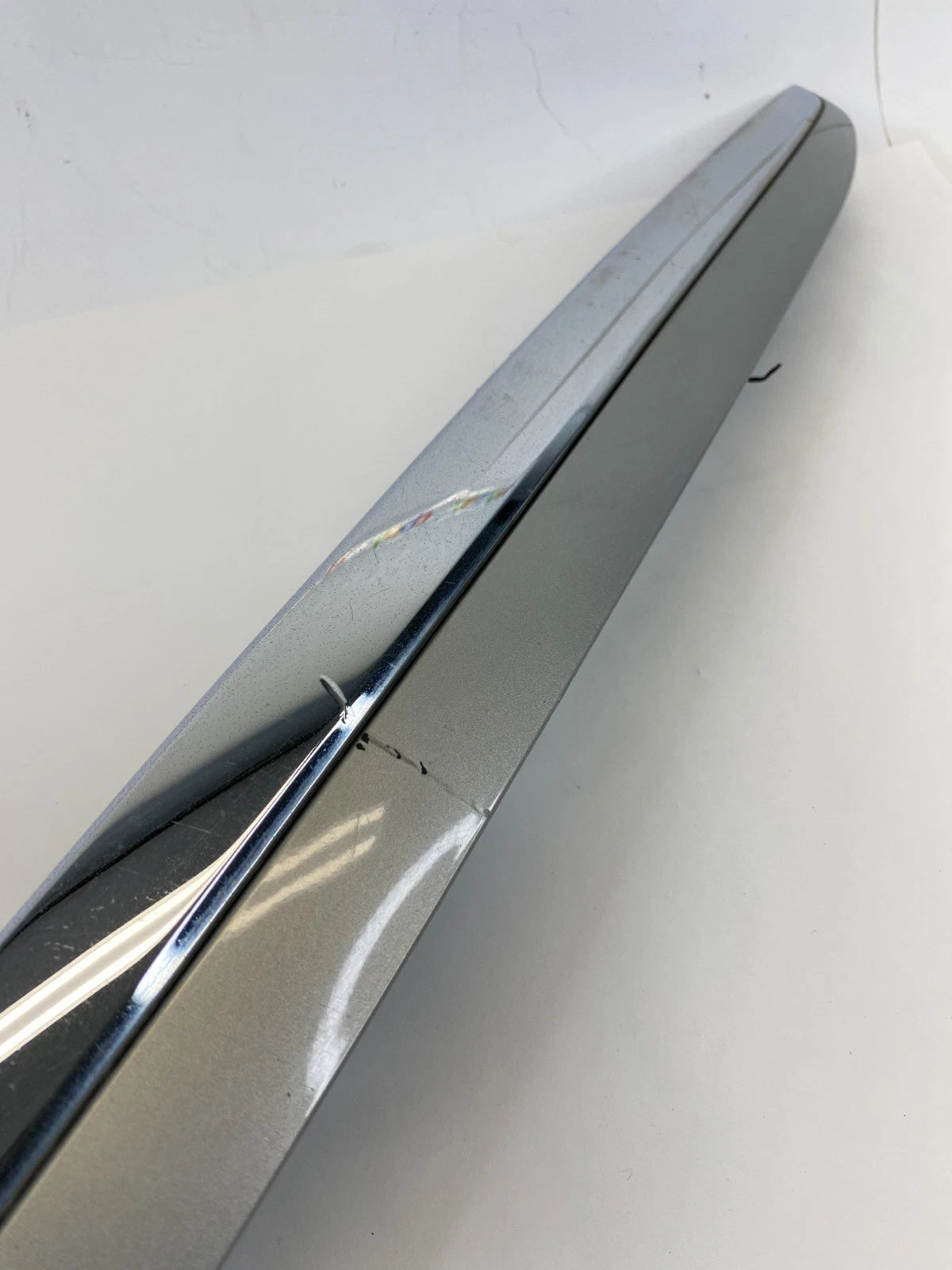 2007-2009 LEXUS RX350 LIFGATE LICENSE PLATE BEZEL TRIM MOLDING 76811-0E010 OEM