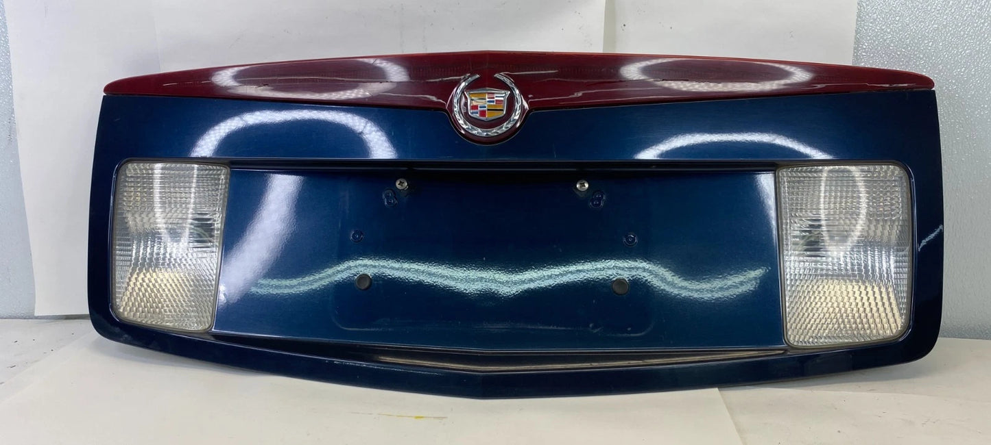 2003-2007 CADILLAC CTS TRUNK PANEL LID TAIL PLATE BEZEL W/ THIRD BRAKE LIGHT OEM