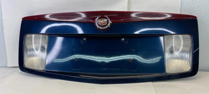 2003-2007 CADILLAC CTS TRUNK PANEL LID TAIL PLATE BEZEL W/ THIRD BRAKE LIGHT OEM