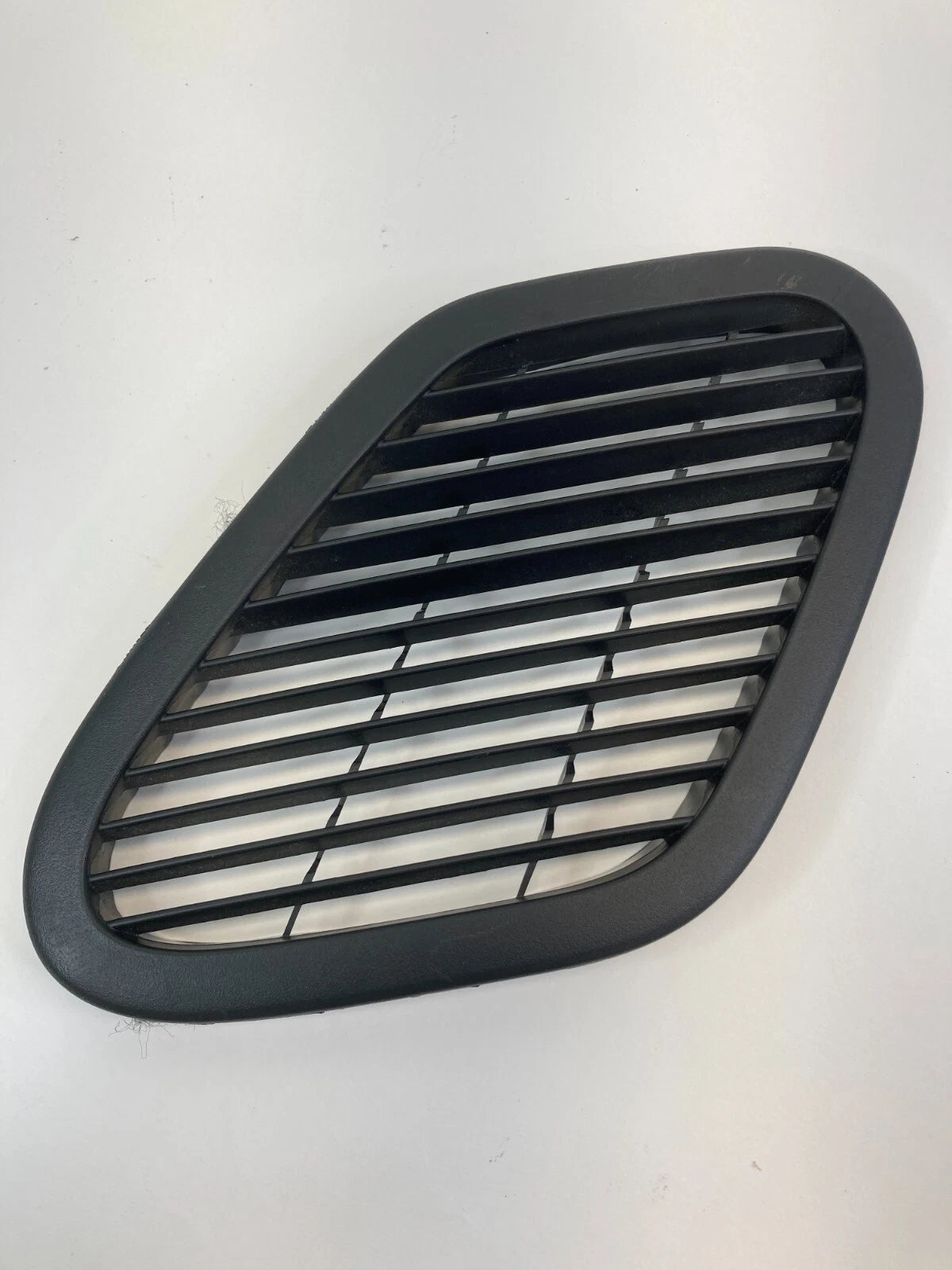 2009-2017 CHEVROLET TRAVERSE LEFT LOWER CENTER CONSOLE AIR VENT DUCT GRILL