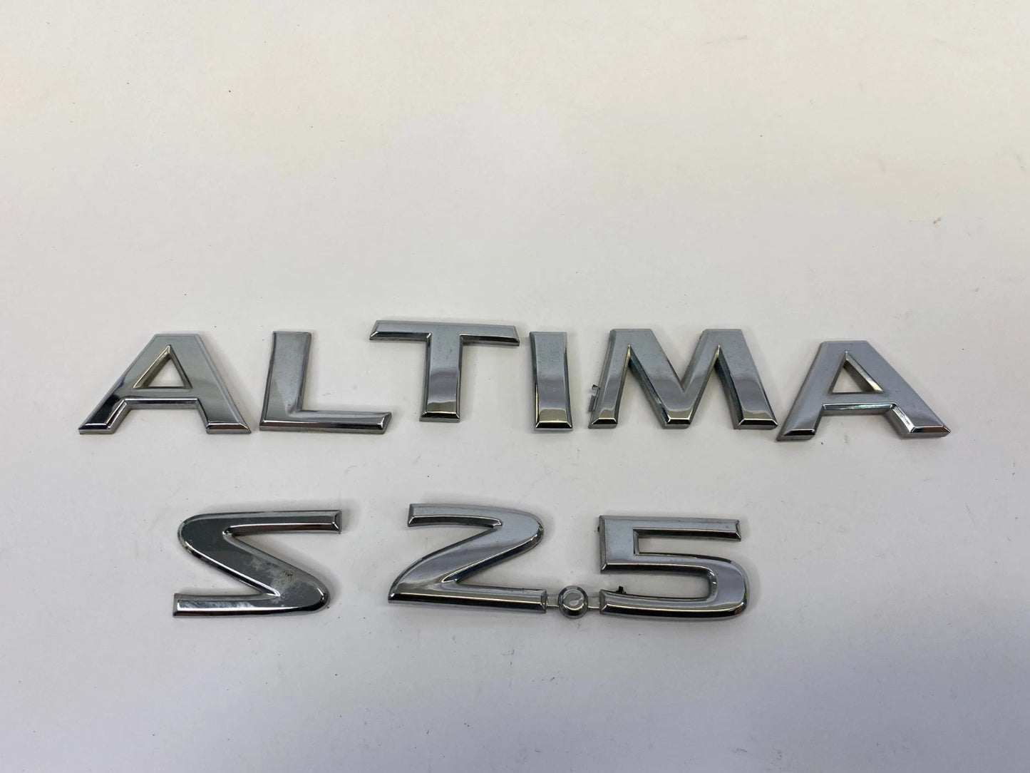 2002-2006 NISSAN ALTIMA REAR DECK LID TRUNK EMBLEM BADGE LETTERS CHROME OEM