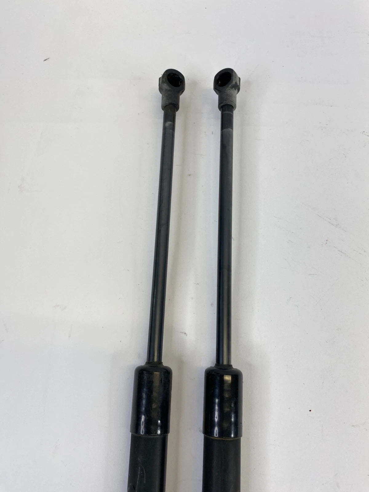 2009-2012 BMW 328i XDRIVE HOOD SHOCK STRUT LIFT SUPPORT PAIR SET 7129190 OEM