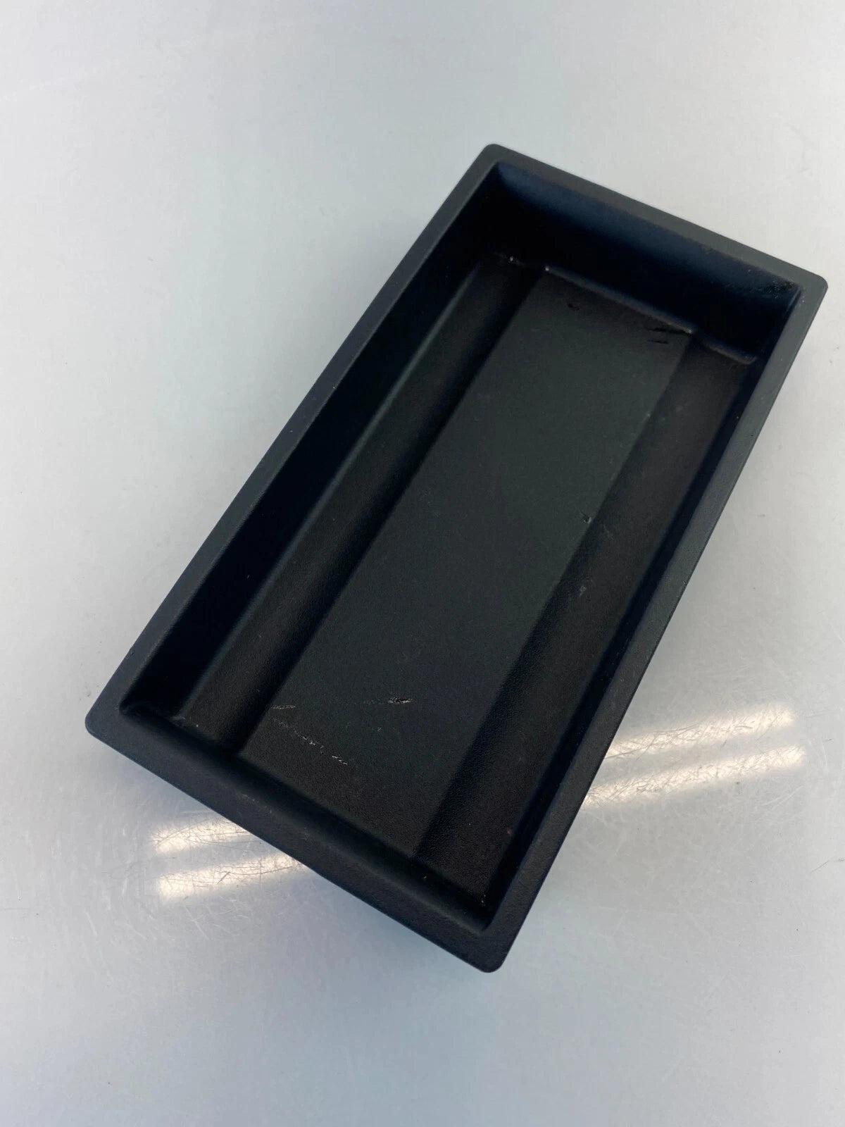 2003-2008 INFINITI G35 SEDAN FRONT CENTER CONSOLE POCKET STORAGE COIN TRAY OEM