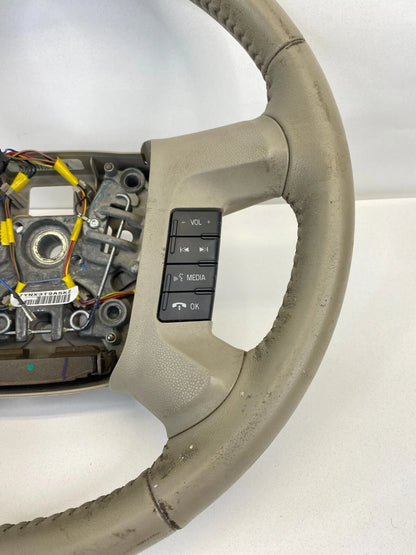 2009 2010 2011 MERCURY MARINER STEERING WHEEL W/ CONTROL SWITCHES TAN LEATHER