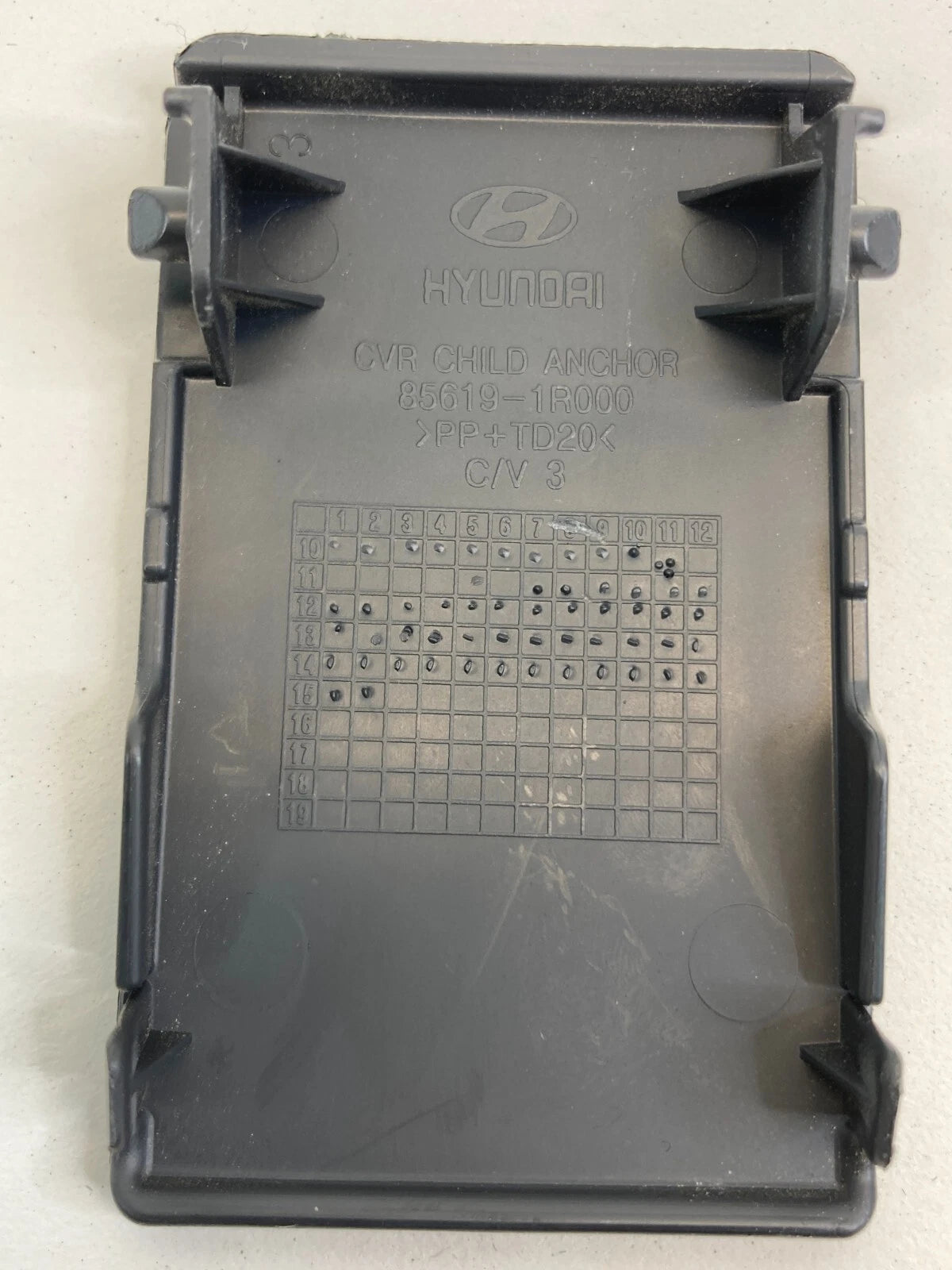 2012-2017 HYUNDAI ACCENT REAR SEAT CHILD RESTRAINT ANCHOR COVER TRIM 85619-1R000