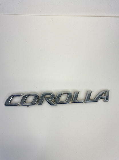 2003-2008 Toyota Corolla Rear Trunk Lid Logo Emblem Badge Nameplate Chrome OEM