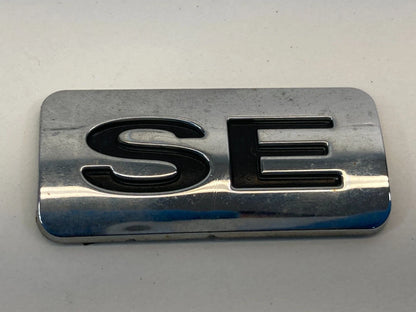 2007-2011 FORD FOCUS SEDAN REAR TRUNK LID NAMEPLATE NAME PLATE ONLY SE TRIM OEM